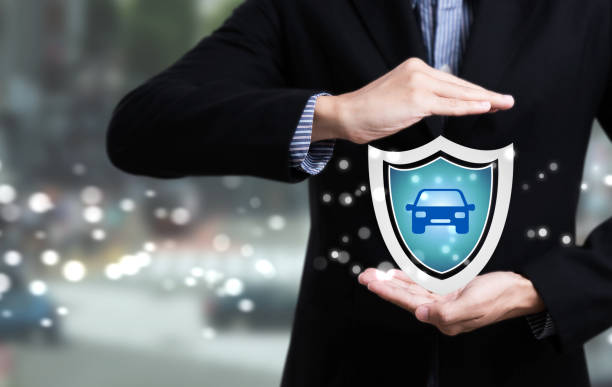 business employees protecting customer care concept car insurance. stock photo