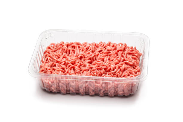 istock Minced meat in a plastic tray isolated on white background 822733698