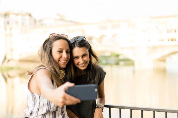 istock Two friends having selfie in the city 822738766