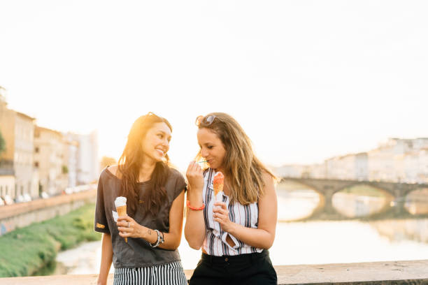 istock Two friends eating ice-cream together 822738962