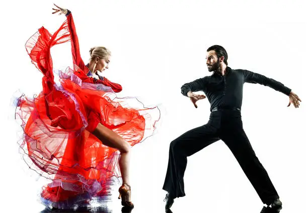 one caucasian man and woman couple ballroom tango salsa dancer dancing in studio silhouette isolated on white background