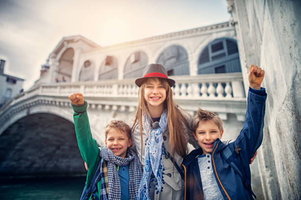 istock Kids tourists visiting Venice, Italy 822745206
