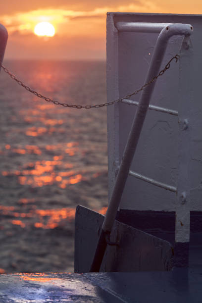 istock Industrial sunset on a ferry in italy 822756166