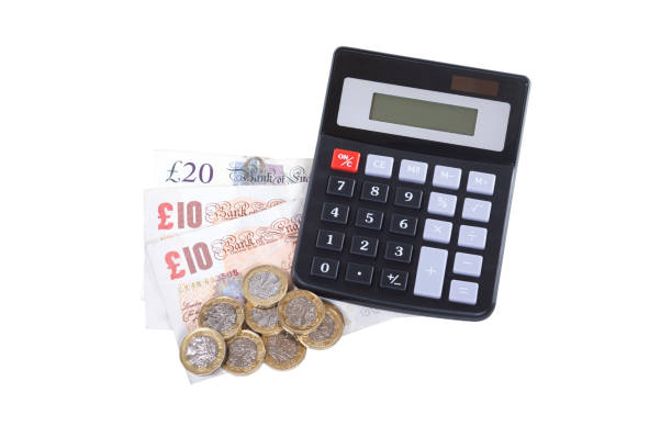 istock Overhead view of a calculator and money 822762450