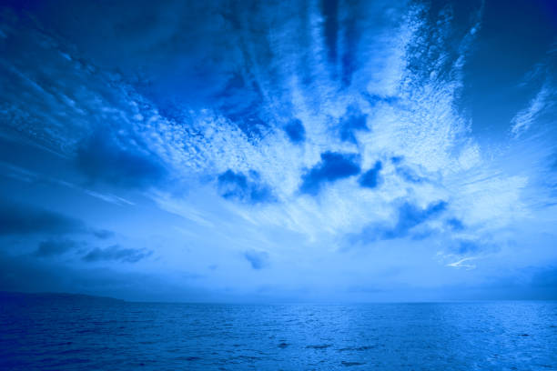 istock Early morning, sunrise over the sea. Blue colored 822801408