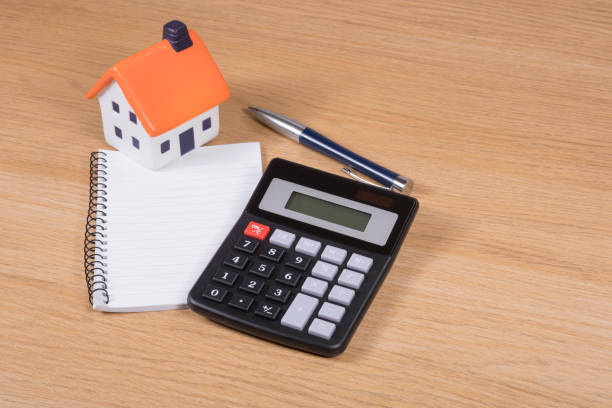istock Calculating the costs of home improvements 822807872