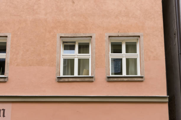 in a historical city of bavaria in south germany at summertime old wooden timber frame buildings with windows, doors and deecorations are a romantical place to have holiday of even relaxing time