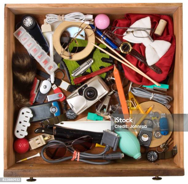 Drawer Full Of Junk Of Various Household Items On A White Background With Clipping Path Stock Photo - Download Image Now