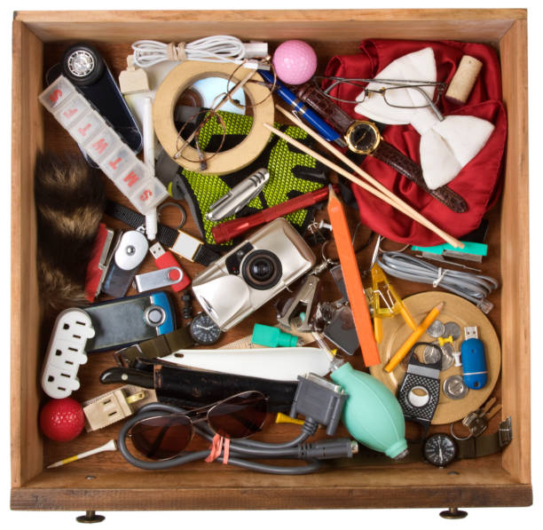 drawer full of junk, of various household items. on a white background with clipping path - obsolete imagens e fotografias de stock