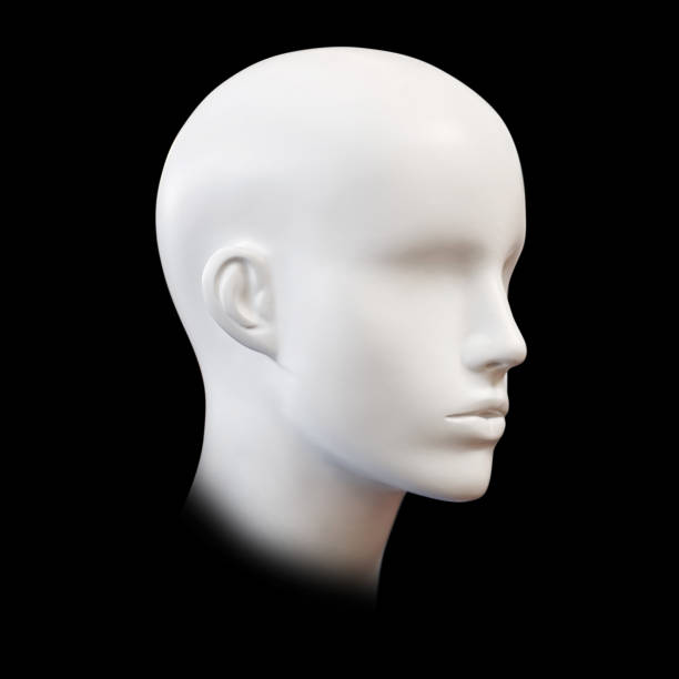 istock Mannequin heads against black background 822887210