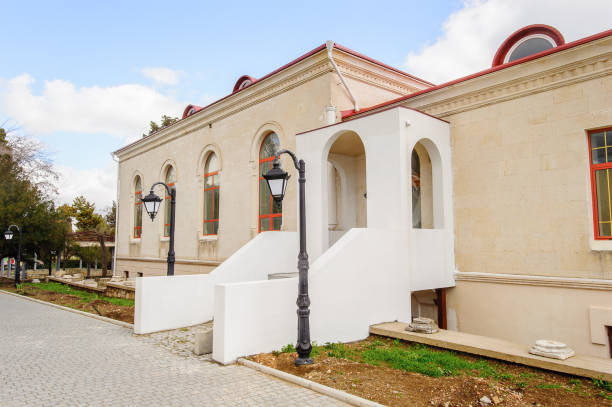 istock House with white porch in front of blue sky 822894814