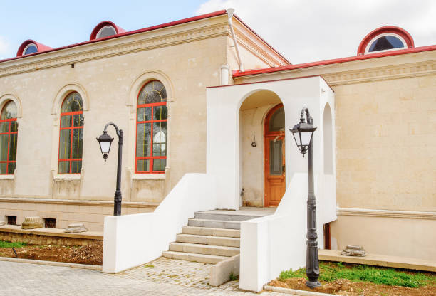 istock White porch with two lamp posts beside 822894964
