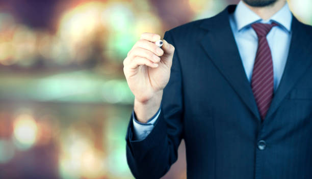 istock businessman  hand marker on screen 822911154