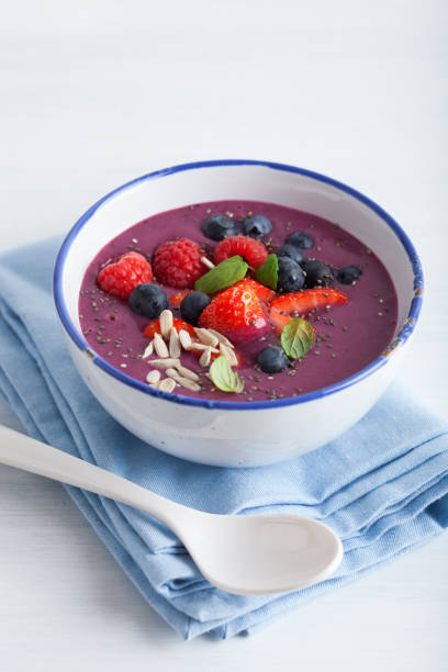 istock healthy berry smoothie bowl with strawberry blueberry raspberry and chia seed 822911362
