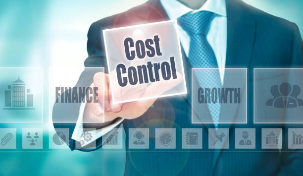 A businessman selecting a Cost Control Concept button A businessman selecting a Cost Control Concept button on a clear screen. lower technology stock pictures, royalty-free photos & images