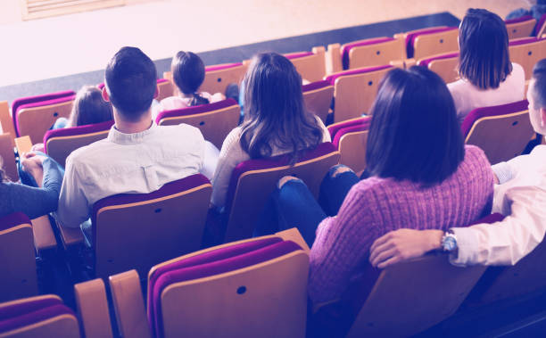 istock People waiting for movie 822918644