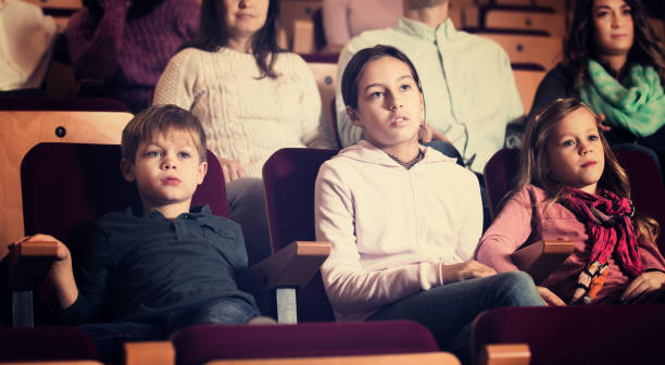 istock People enjoying film screening in cinema 822918742