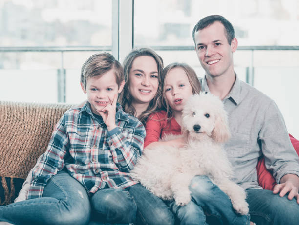 istock Optimistic family enjoying together at home 822918918