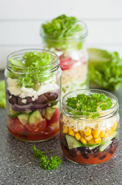 istock healthy vegetable cheese salad in mason jars 822927994