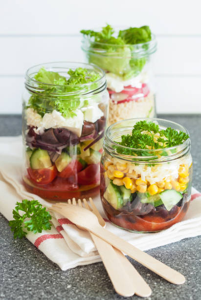 istock healthy vegetable cheese salad in mason jars 822928292