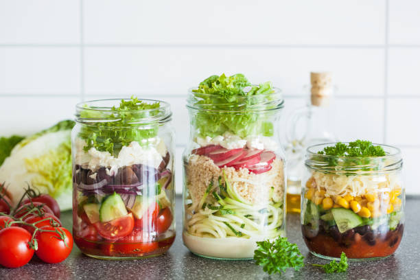 istock healthy vegetable cheese salad in mason jars 822928580