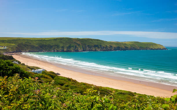 Putsborough Sands from Woolacombe Warren Devon England View towards Putsborough Sands from Woolacombe Warren Devon England UK Europe devon stock pictures, royalty-free photos & images