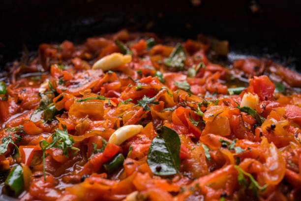 istock Tomato Curry or Sabzi or sabji or chutney, popular indian vegetable menu for main course 822933096
