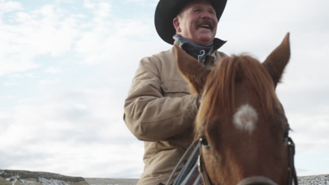 White Middle-Aged Cowboy Smiling