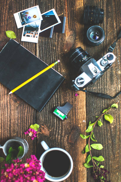istock Photographer accessories on the table conceptual photography background. 822959236