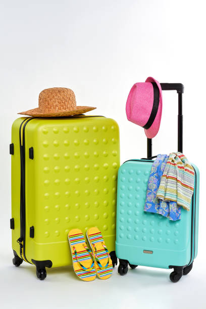 istock Colorful summer clothes and suitcases. 822960962
