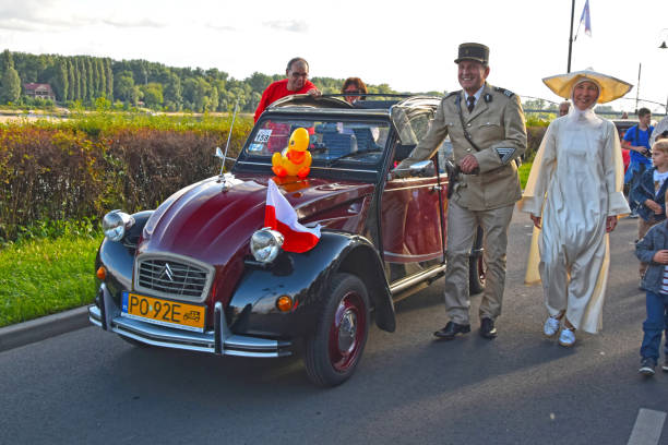 Torun, Poland - 31 July, 2015: Classic Citroen 2CV during the parade on the 21. International Meeting of 2CV Friends. The participants of the parade dressed in interesting costumes for example referring to a movie 