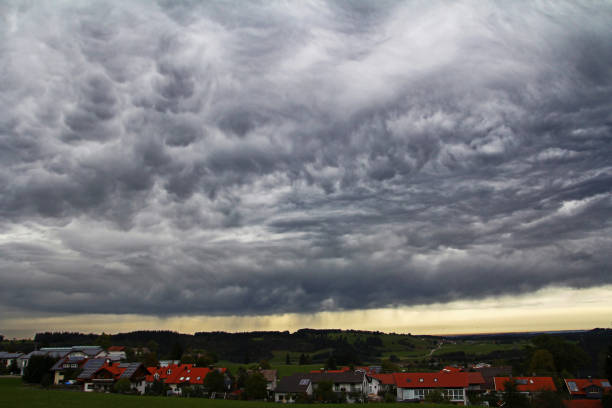 istock Dark eerie storm clouds over a city 823010330