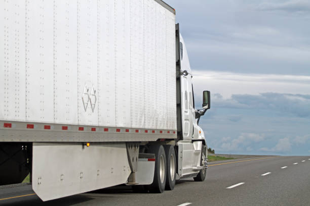 istock Semi Truck Hauling Freight On The Highway 823018256