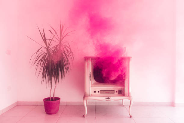 Millennial Pink Pink Smoke coming out of an old TV offbeat stock pictures, royalty-free photos & images