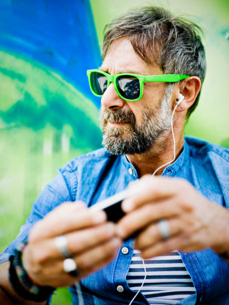 Portrait of mature man, graffiti on background