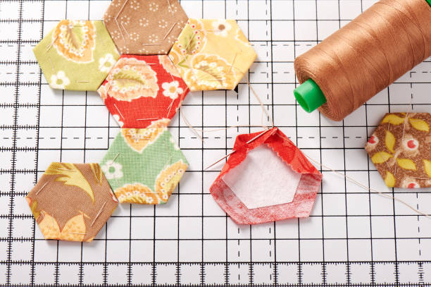 istock English paper pieced hexagons on white craft mat 823081288
