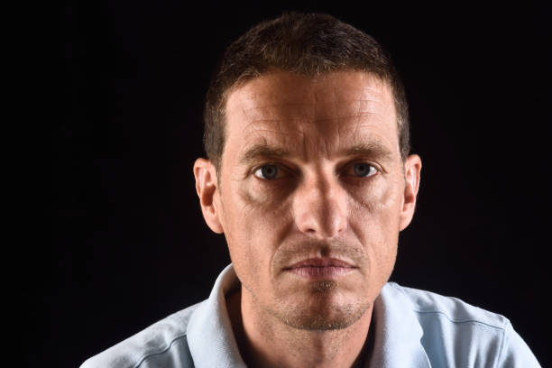 istock portrait of a man with black background 823084348
