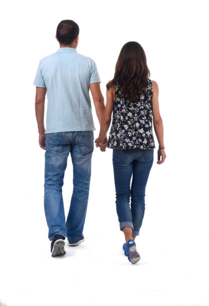 A couple of forty years walking on white background A couple of forty years walking on white background man touching womans buttock stock pictures, royalty-free photos & images