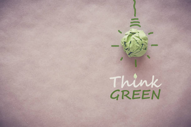 istock Green paper light bulb with Think Green, eco energy saving concept 823094614