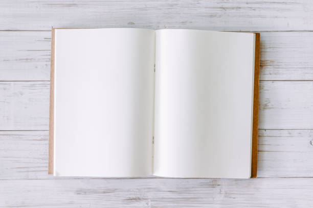 istock Open book with blank pages on wooden background 823103724