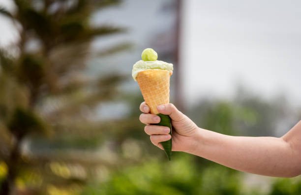 istock Woman hand hold ice cream 823103798