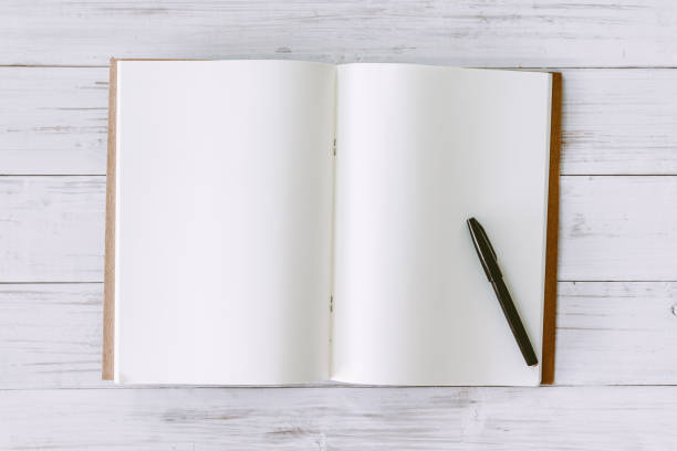 istock Open book with blank pages on wooden background 823103978