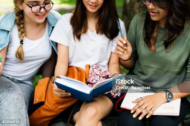 Education Students People Knowledge Concept Stock Photo - Download Image Now - Adult Student, Book, Campus