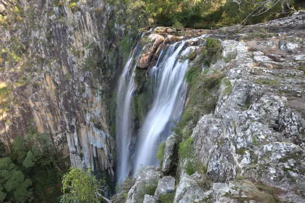 A slow shutter of the waterfall at Minyon Falls near Byron Bay in NSW Australia.