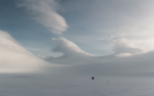 Nature covered in snow and clouds in Lapland