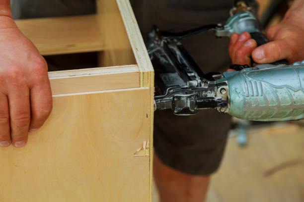 istock Gauge Finish Nailer man nailed slats customkitchen, cabinet, adjustment, assembling contractor 823179292