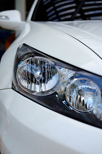 Close up of Beautiful white car headlight style, selective focus.