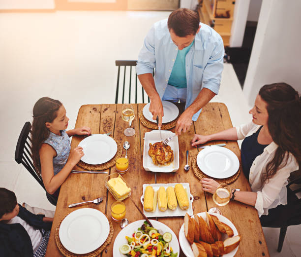 istock Father does the honors before we can indulge 823186378