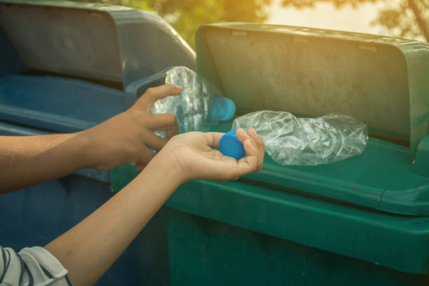 istock Group of kids volunteer help garbage collection charity environment. 823202250