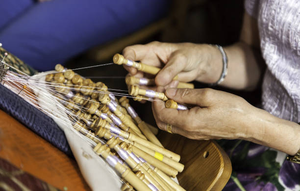 istock Woman sewing bobbins 823229278